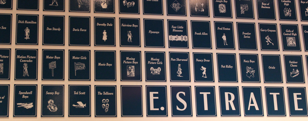 Exhibit design showing the titles created by Edward Stratemeyer.